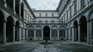 Dario Vitale guida Emporio Armani: il cortile di un palazzo storico milanese all'alba