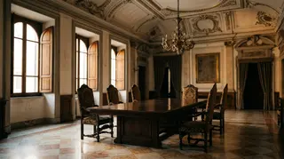Comitato di selezione Oscar: sala istituzionale romana vuota con lungo tavolo e sedie
