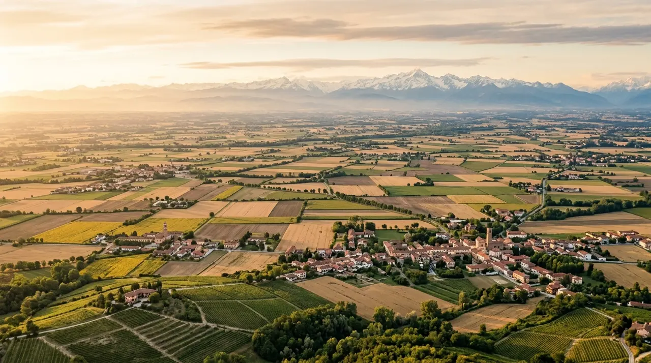 Veduta aerea della pianura piemontese con le Alpi sullo sfondo: le otto province in cui vanno raccolte le firme per il congresso regionale
